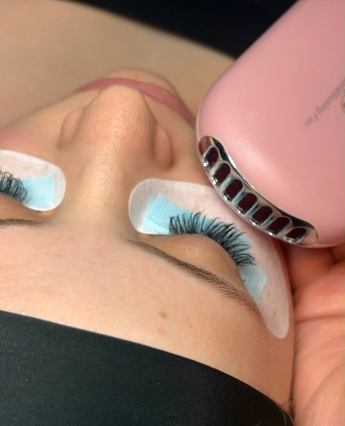 Lash extension application at JC Cosmetics